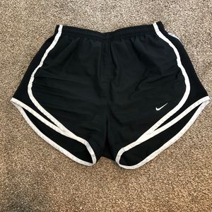 Black Nike running shorts